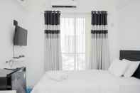 Bedroom Elegant and Comfortable Studio Apartment at Sky House BSD