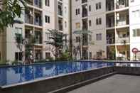 Swimming Pool Bright & Stylish 2BR Hook Apartment At Sudirman Suites Bandung