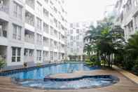 Swimming Pool Comfortable and Simply Studio Apartment at Tamansari Skylounge