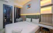 Bedroom 3 Nice and Comfy Studio Apartment at Transpark Cibubur