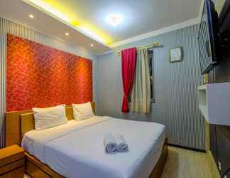 Bedroom 2 Lush 3BR Residence at Grand Palace Kemayoran