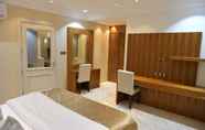 Kamar Tidur 7 Crown City Hotel