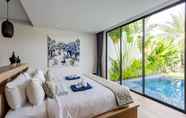 Bedroom 5 Cocoon villas by Lofty