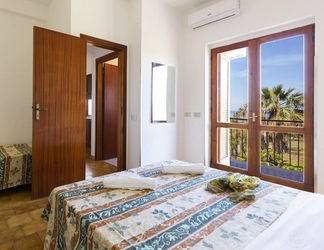 Kamar Tidur 2 Residence Limoneto Capo Vaticano