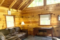Ruang Umum Kozy Haven Log Cabin Rentals