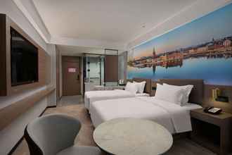 Kamar Tidur 4 Ramada Encore by Wyndham Wuhan West