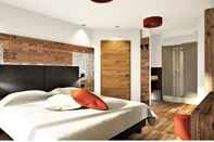 Kamar Tidur Active Alm Hotel