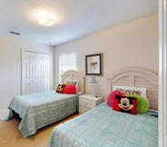 Bedroom 4 Anthea's Orange Tree Vacation Home