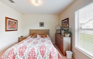 Bedroom 3 Anthea's Orange Tree Vacation Home