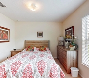 Bedroom 3 Anthea's Orange Tree Vacation Home