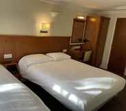 Kamar Tidur 2 Orchard Hotel