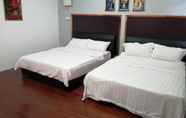 Kamar Tidur 4 Comfortable Family Room for 4 People in Kuching With Ac - Amida Point Services