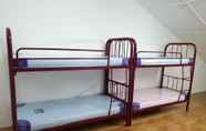 Bilik Tidur 2 Single Bed in Mixed Dormitory Room With Ac