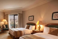 ห้องนอน Conrad Cairo,twin Classic Room, Partial Nile View