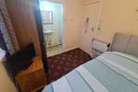 Kamar Tidur The Coach House Rooms