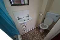 Toilet Kamar The Coach House Rooms