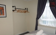 Bedroom 3 One Bedroom Apartment by Klass Living Serviced Accommodation Blantyre - Welsh Drive Apartment with Wifi