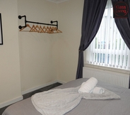 Bedroom 3 One Bedroom Apartment by Klass Living Serviced Accommodation Blantyre - Welsh Drive Apartment with Wifi