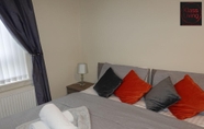 Bedroom 4 One Bedroom Apartment by Klass Living Serviced Accommodation Blantyre - Welsh Drive Apartment with Wifi