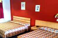 Kamar Tidur Cozy Corner Motel & Restaurant