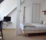 Bedroom 4 Hotel a Licorne
