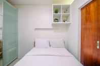 ห้องนอน Elegant And Comfy 1Br Apartment At Woodland Park Residence