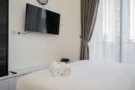 Bedroom Elegant And Comfy Studio At Sky House Bsd Apartment