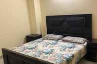 Bedroom Lovely 2-bed Apartment in Rawalpindi
