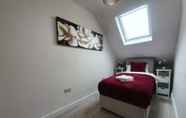 Bedroom 4 Bedford Town Centre Conduit6-2br by Homely Spaces