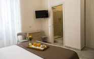 Kamar Tidur 4 BED AND BREAKFAST PORT INN