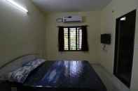Bedroom Rajabala Residency