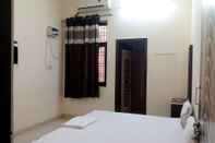 Bedroom Goroomgo Laddu Gopal Guest HouseMathura