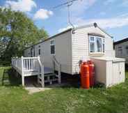 Exterior 2 2 Bedroom Caravan at Heacham Beach With Decking