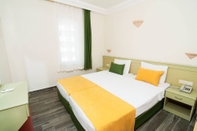 Bilik Tidur Magnolia Suites Otel