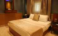 Bedroom 7 Grand Nile Royal Hotel at Nile Plaza
