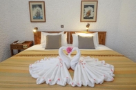 Kamar Tidur Flamingos Hotel