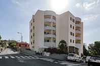 Exterior Alegria I, Overlooking the bay of Funchal