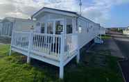 Exterior 3 Lovely 3-bed Lodge in Towyn Near Rhyl