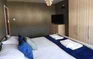 Kamar Tidur 6 Woodland Park Residence