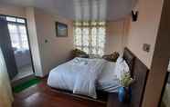 Bedroom 4 Goroomgo Olive Branch Darjeeling