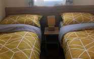 Bedroom 2 Lovely 3-bed Caravan With Hot Tub in Lincolnshire