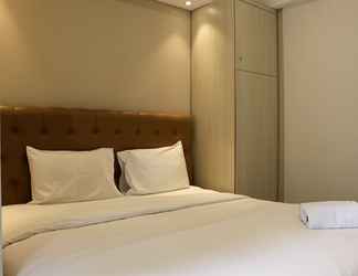 Bedroom 2 Minimalist and Comfort 1BR at Gold Coast Apartment
