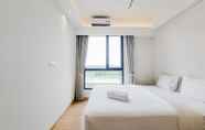 Bedroom 3 Nice and Elegant 2BR at Sky House BSD Apartment