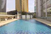 Swimming Pool Exclusive and Cozy 2BR Apartment at The Empyreal Epicentrum