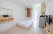 Bedroom 4 Homey and Comfort Living Studio Room at Bassura City Apartment