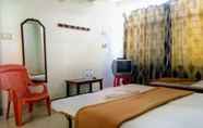 Kamar Tidur 4 Goroomgo Ashwini Lodge Mysore