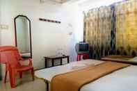 ห้องนอน Goroomgo Ashwini Lodge Mysore