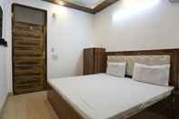 Bedroom Goroomgo Double Tree Ghaziabad