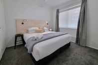 Kamar Tidur Adamstown Short Stay Apartments