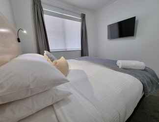 Kamar Tidur 2 Adamstown Short Stay Apartments